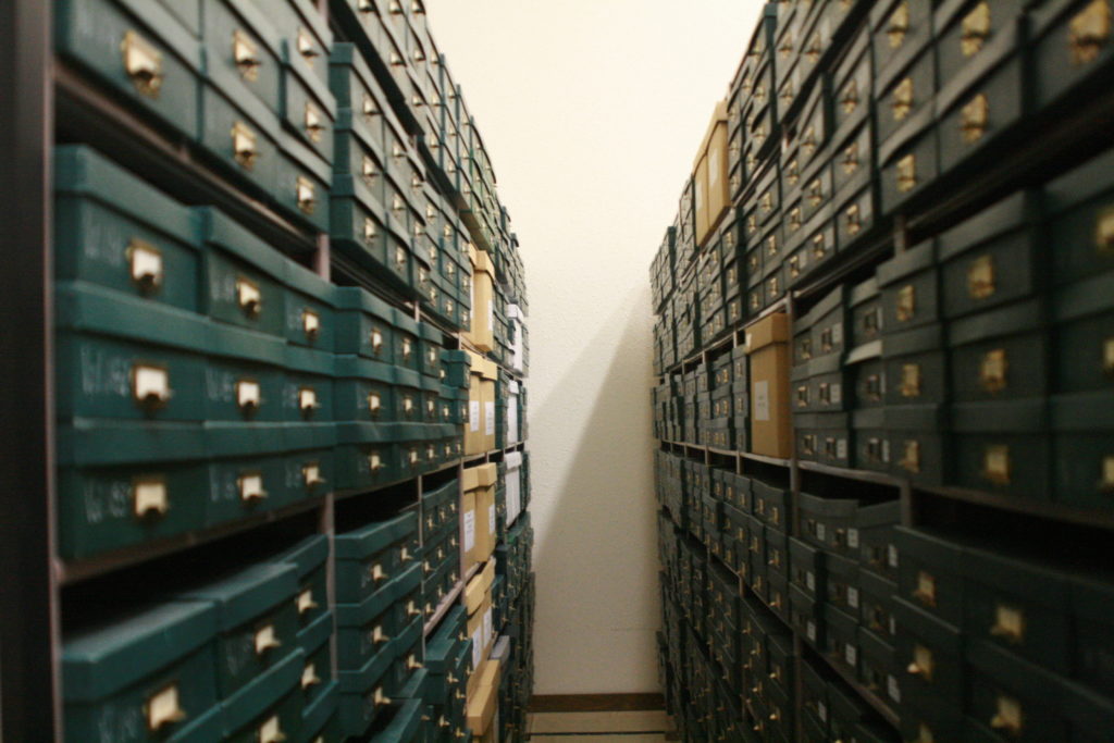 Stacks of denominational records within the vault at the Mennonite Heritage Archives. 